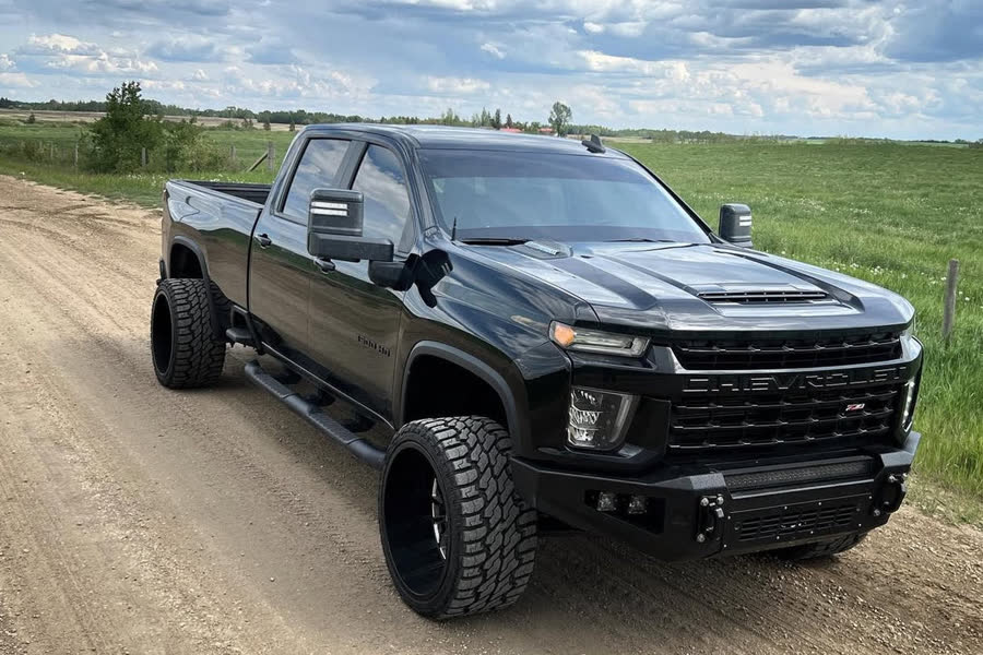 Black Chevrolet Silverado HD with a Gridiron Base front bumper