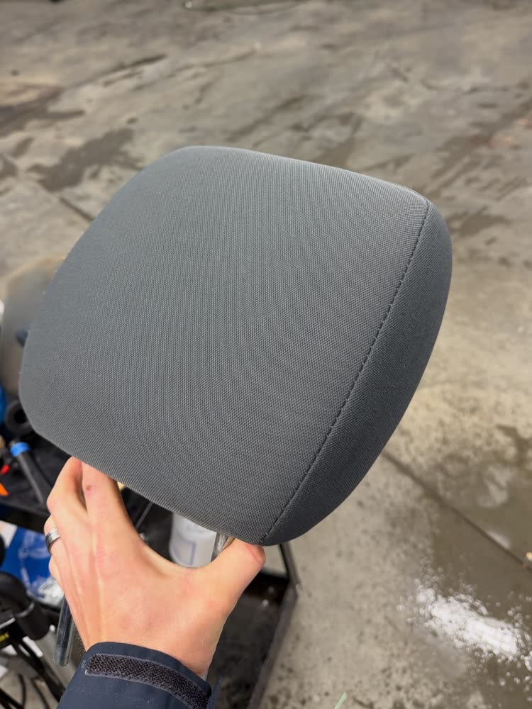 The same headrest after the detail, clean and even